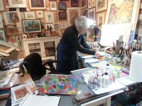 Blog Photo - Artist Sandra stands at work table